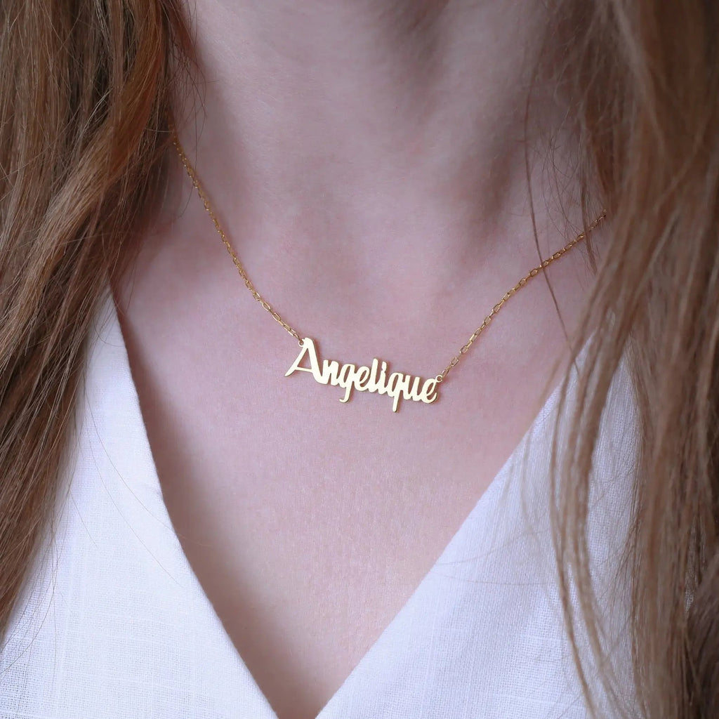 Personalized name necklace in elegant script font with a delicate gold chain and clasp. — view 5
