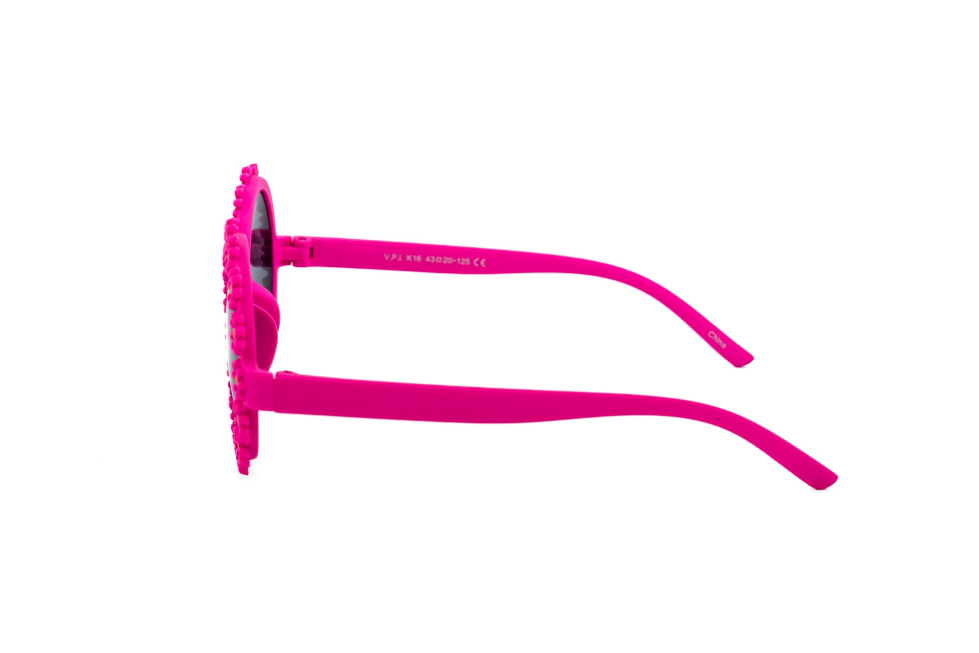 Hot pink kids daisy flower sunglasses with 3D frames and round smoke tinted lenses — view 3