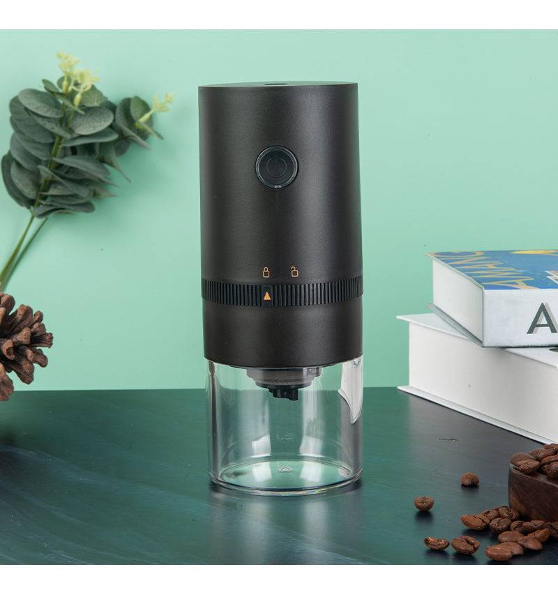 Portable electric coffee grinder with ceramic burr mechanism transparent chamber and sleek modern travel design — view 2