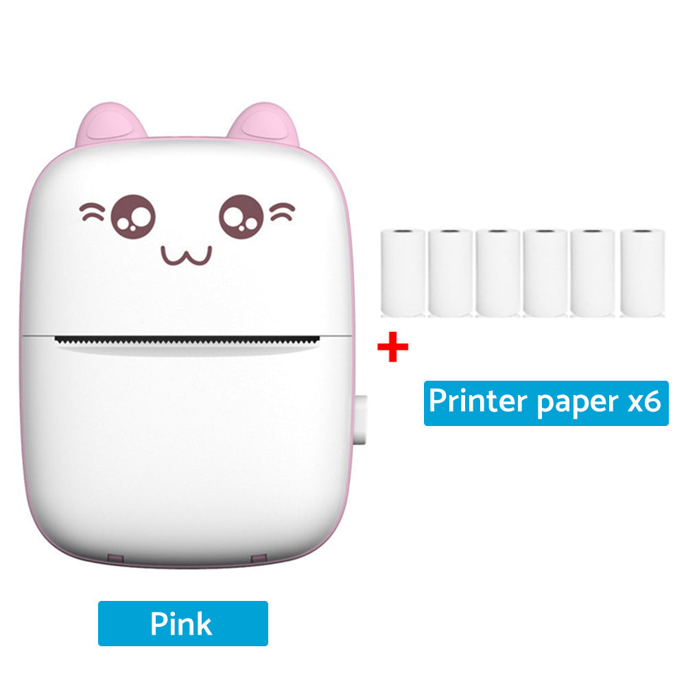 Mini thermal pocket printer with printed labels, smartphone connection, and six blank white paper rolls — view 3