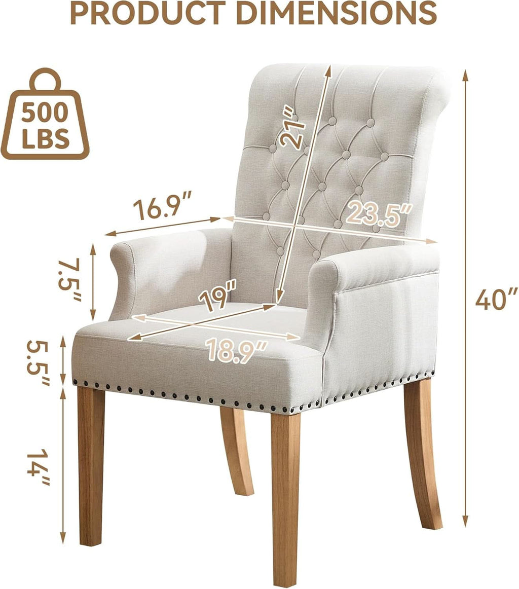 Beige upholstered dining chair with armrests, tufted backrest, and solid wood legs on a neutral background — view 2