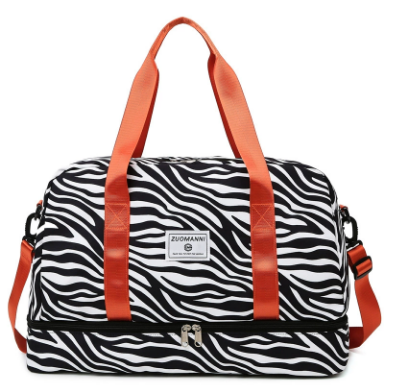Versatile women's weekender gym and yoga travel bag with spacious compartments and sturdy carrying handles. — view 3