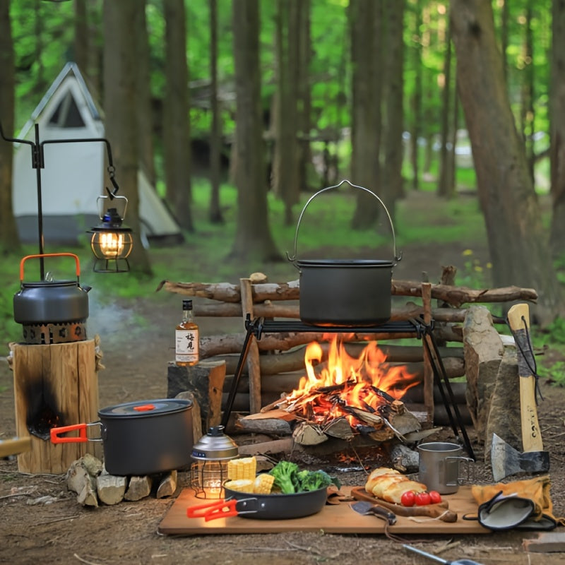 Ultra-light aluminum camping cookware set featuring orange accents, pots, pans, and a matching kettle. — view 3