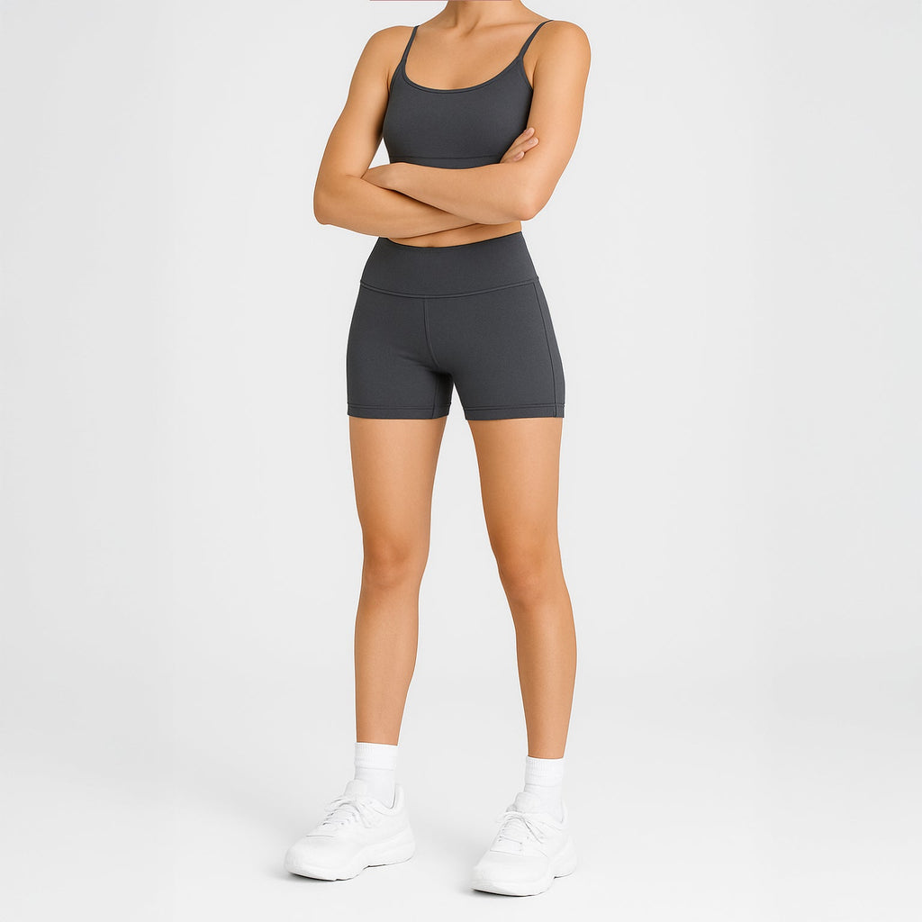 Women's athletic legging shorts in black with high rise waistband and flatlock seams — view 2