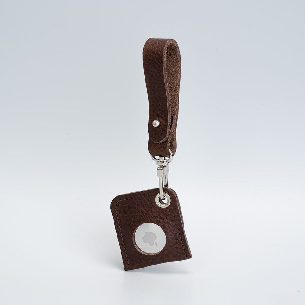 Leather AirTag bag charm attached to a metal ring, crafted from full-grain premium Italian leather — view 3