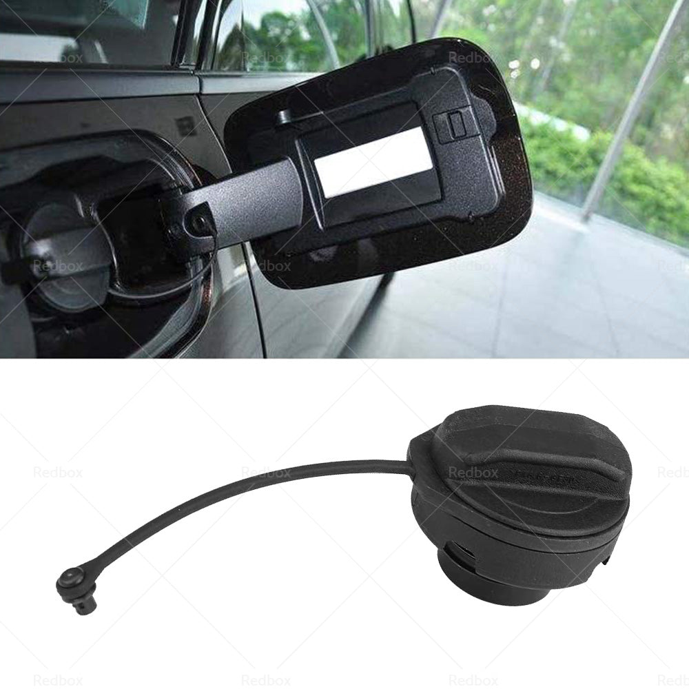 Black replacement fuel tank cap with safety tether made of durable ABS plastic for automobiles — view 5