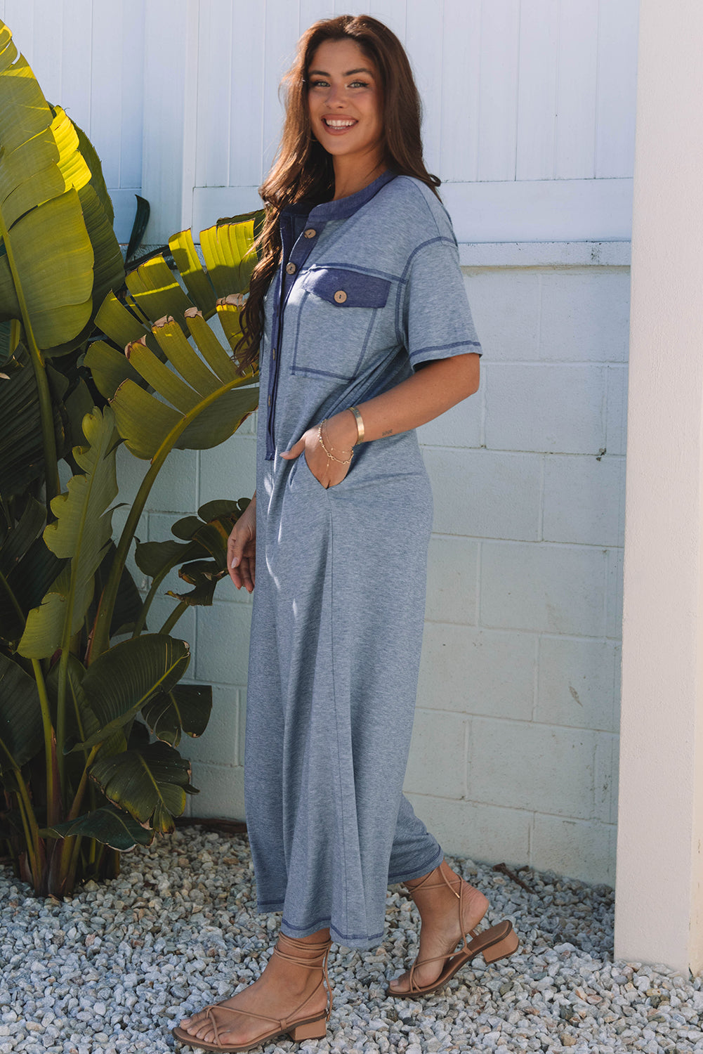 Womens blue wide leg short sleeve jumpsuit with half placket and functional chest pockets — view 3