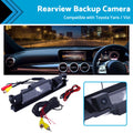 Car reverse backup camera for Toyota Yaris with wiring cables and mounting accessories.