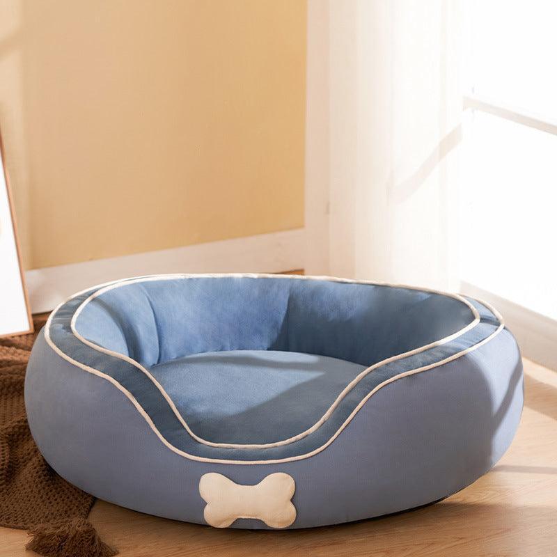 Deluxe cozy pet sofa bed in dark blue with plush cotton filling and comfortable side bolsters — view 3