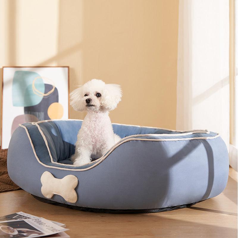 Deluxe cozy pet sofa bed in dark blue with plush cotton filling and comfortable side bolsters