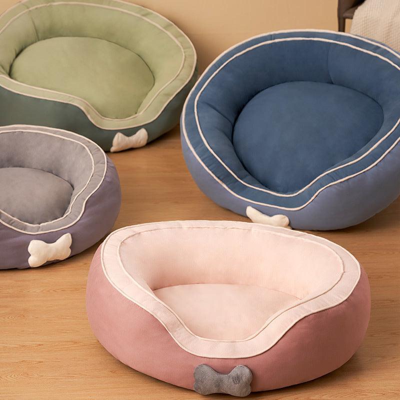 Deluxe cozy pet sofa bed in dark blue with plush cotton filling and comfortable side bolsters — view 5