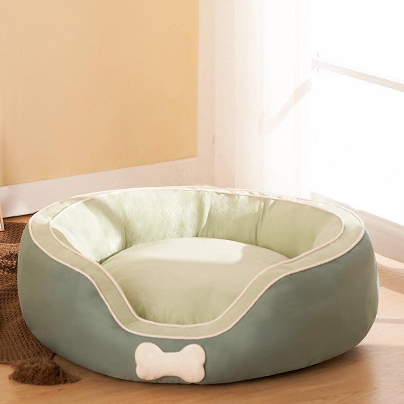 Deluxe cozy pet sofa bed in dark blue with plush cotton filling and comfortable side bolsters — view 2