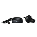 Black desktop charging dock stand for TTfone mobile phones sitting on a clean surface