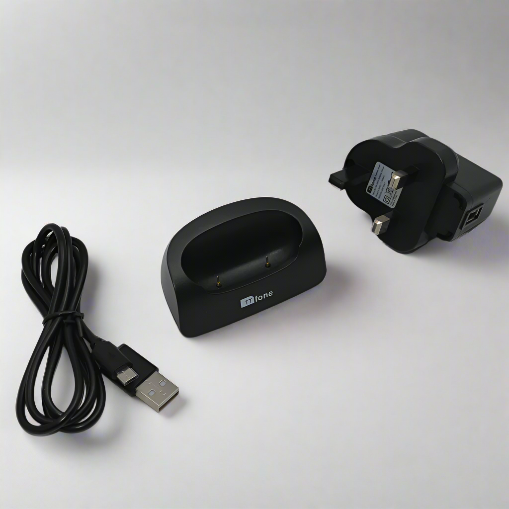 Black desktop charging dock stand for TTfone mobile phones sitting on a clean surface — view 2