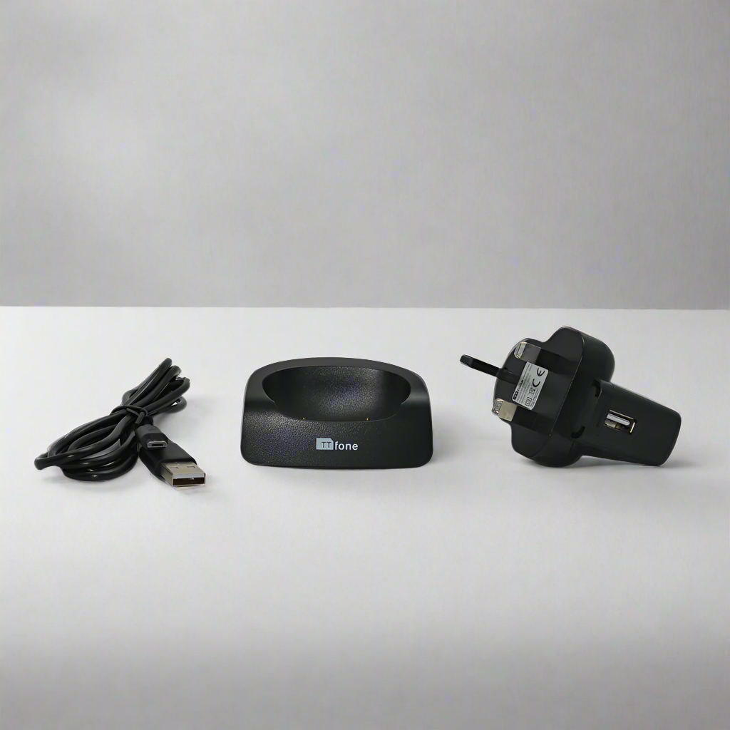 Black desktop charging dock stand for TTfone mobile phones sitting on a clean surface — view 5