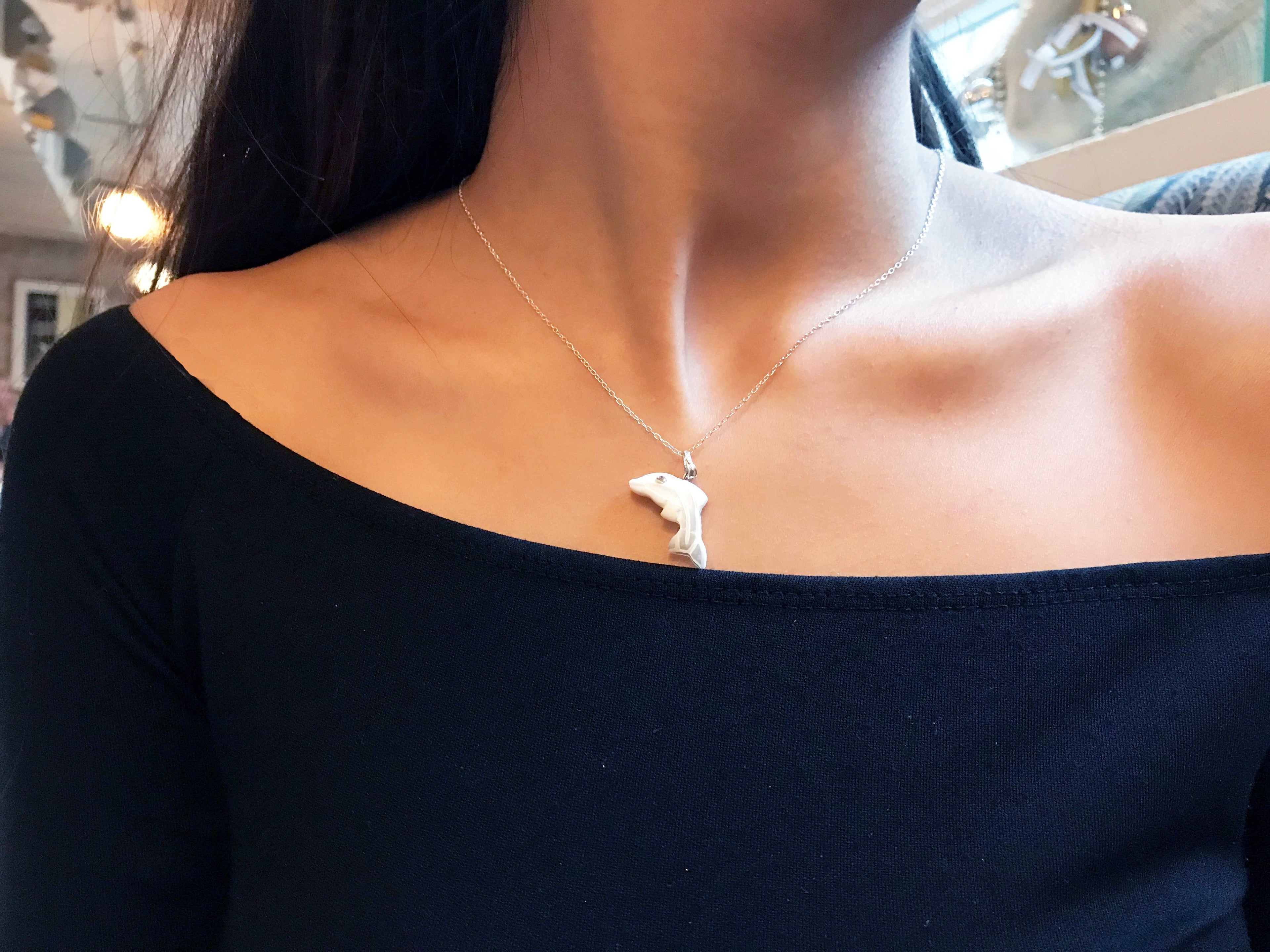 Sterling silver dolphin necklace with mother of pearl charm and an inspiring affirmation message card. — view 2