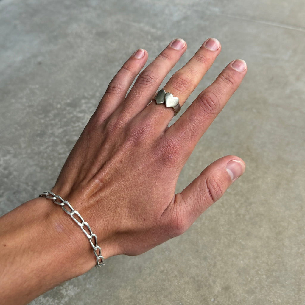 Crossed hearts silver ring with adjustable open back and distressed vintage style finish. — view 4