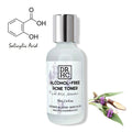 Clear bottle of liquid alcohol-free acne face toner with salicylic acid for sensitive breakout-prone skin.