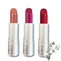 Natural organic vegan matte lipstick tube and rich color swatches on a clean background