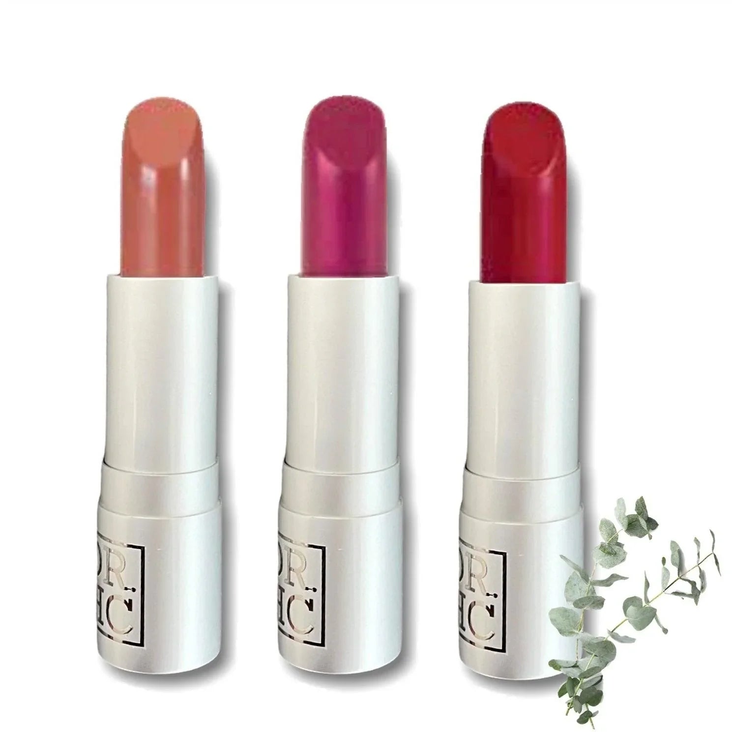 Natural organic vegan matte lipstick tube and rich color swatches on a clean background