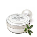 Translucent mattifying pearl face powder in a round jar for setting makeup and skincare