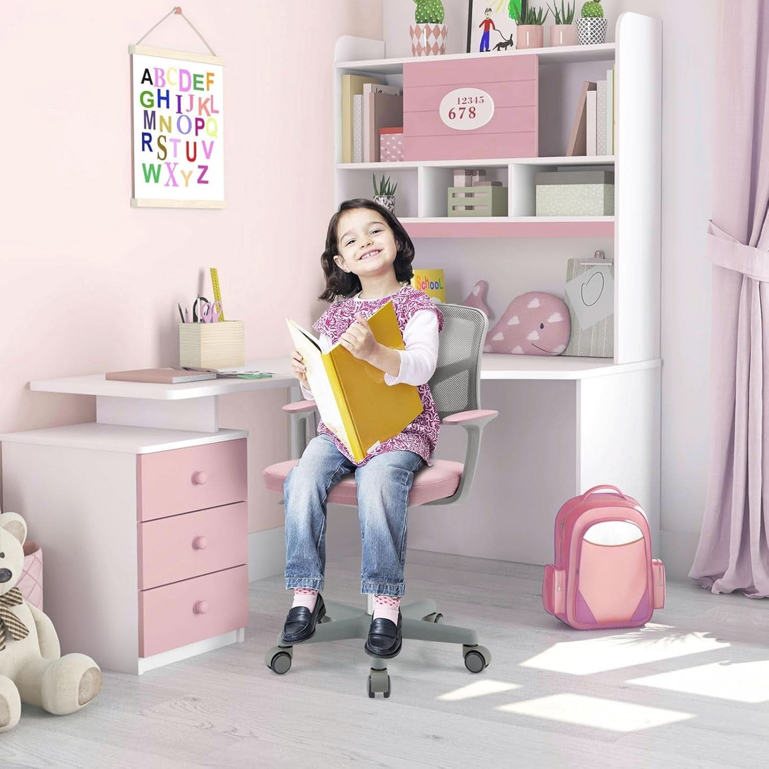 Ergonomic pink kids desk chair with breathable mesh back, lumbar support, and rolling casters. — view 2