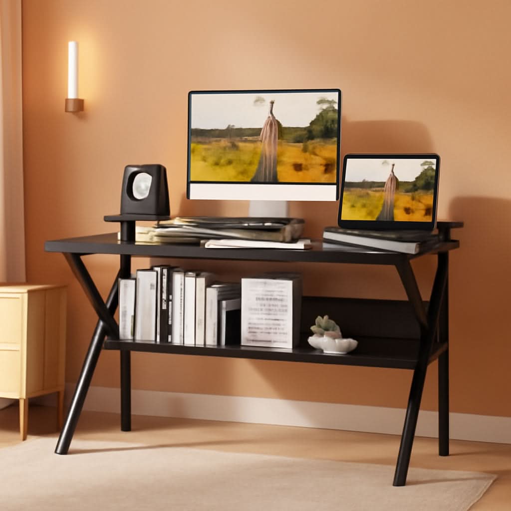 Compact 27.5-inch black computer desk with ergonomic monitor stand, lower storage shelf, and metal frame