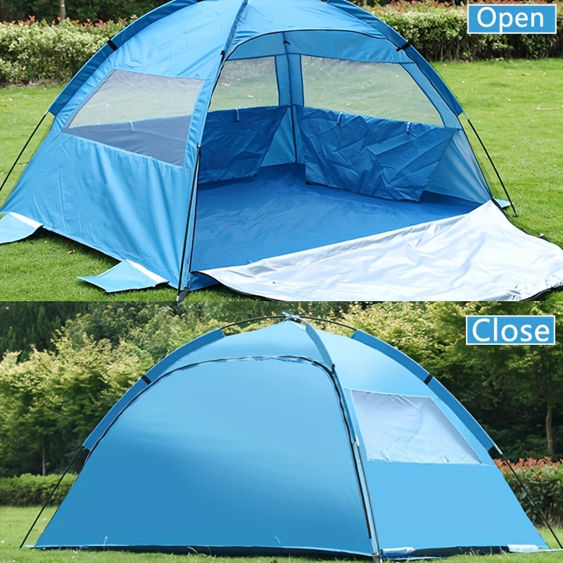 Blue pop-up beach tent sun shelter with extendable footprint and mesh windows on sand. — view 3