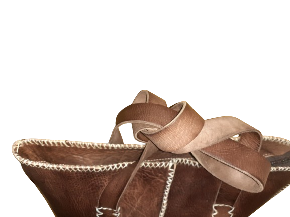 Medium rectangular rustic cowhide leather handbag with white stitching and sturdy dual handles. — view 6