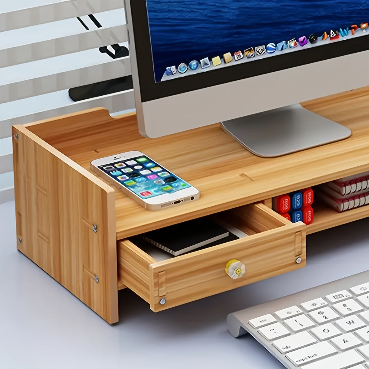 Cherry wood rectangular monitor stand with a built-in storage drawer and keyboard tray underneath. — view 3