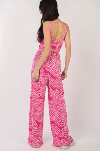 Women's printed pleated sleeveless wide leg jumpsuit in lightweight polyester with built-in side pockets — view 2