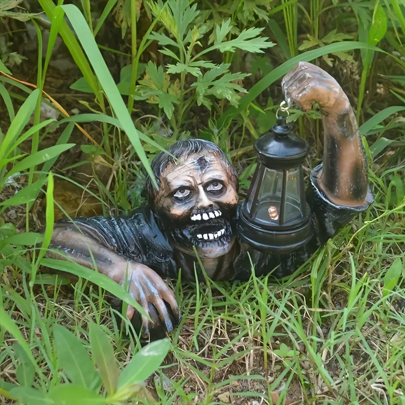 Realistic crawling zombie garden statue holding an LED lantern, made of hand-painted resin. — view 4