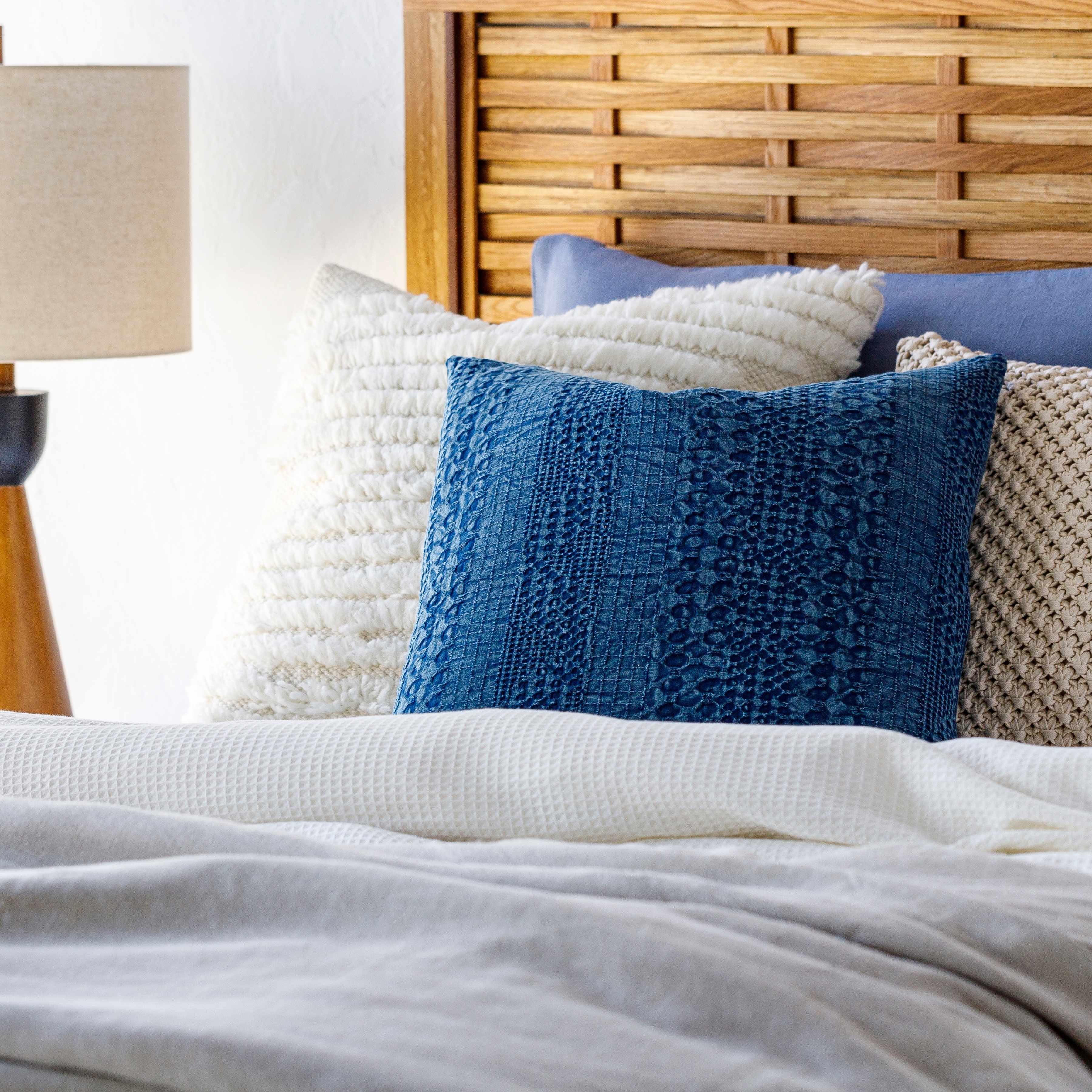 Square navy blue 100% cotton woven throw pillow cover featuring subtle abstract texture details — view 5