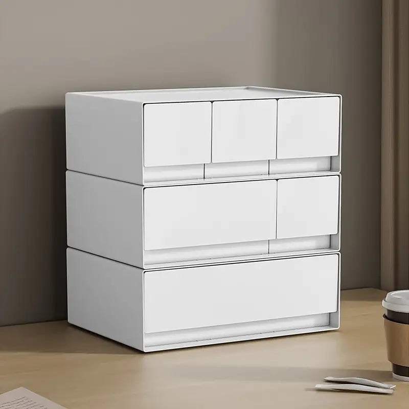 Stackable white plastic bedside drawer organizer with multiple storage layers for bedroom essentials — view 4