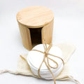 Reusable bamboo cotton makeup remover pads in black and white with mesh laundry bag