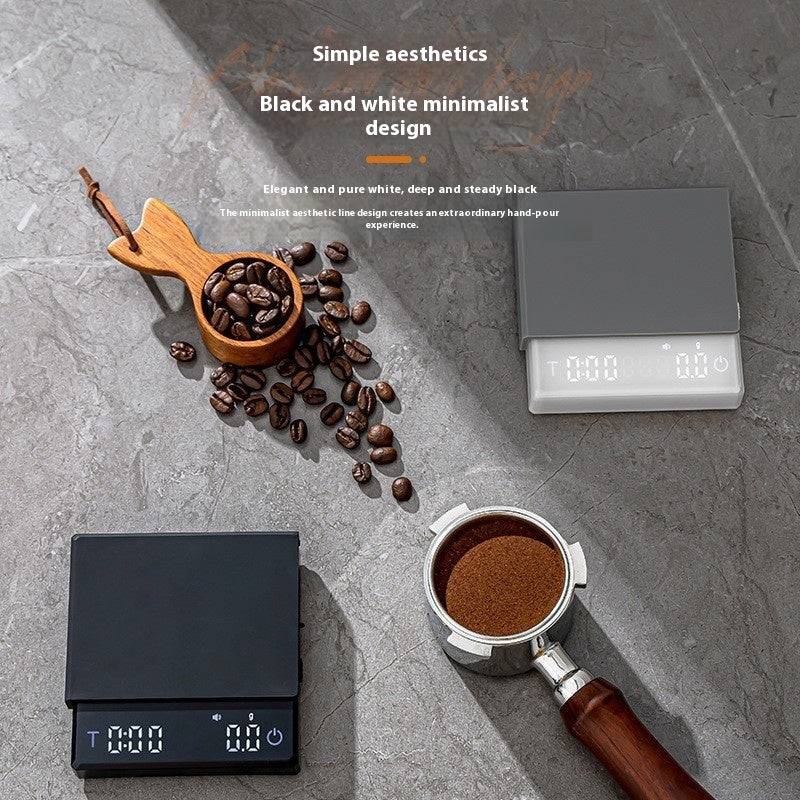 Black high precision coffee scale with digital display and built in timer for pour over brewing