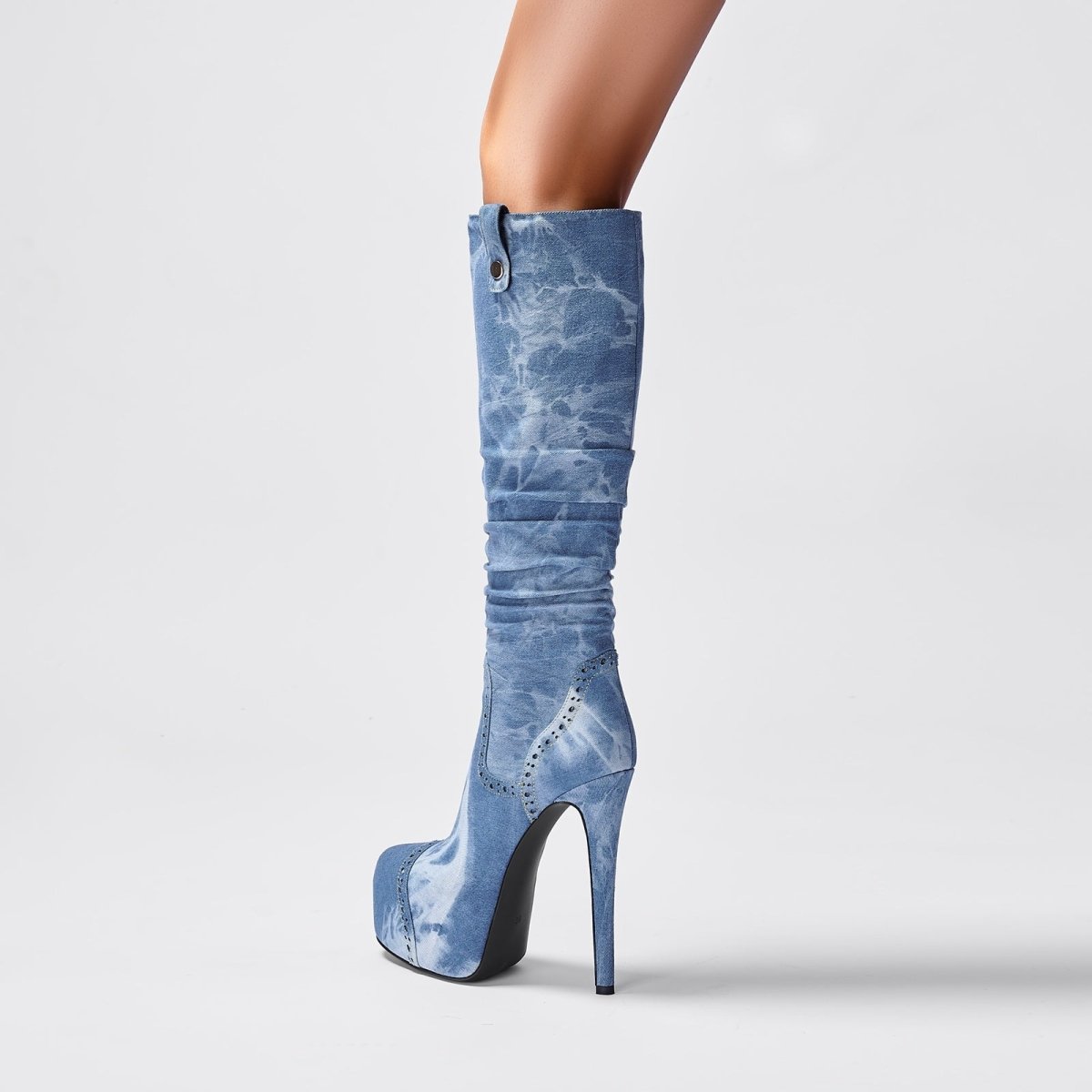 Elegant knee high washed denim stiletto boots with a pointed toe and rhinestone western paneling — view 2