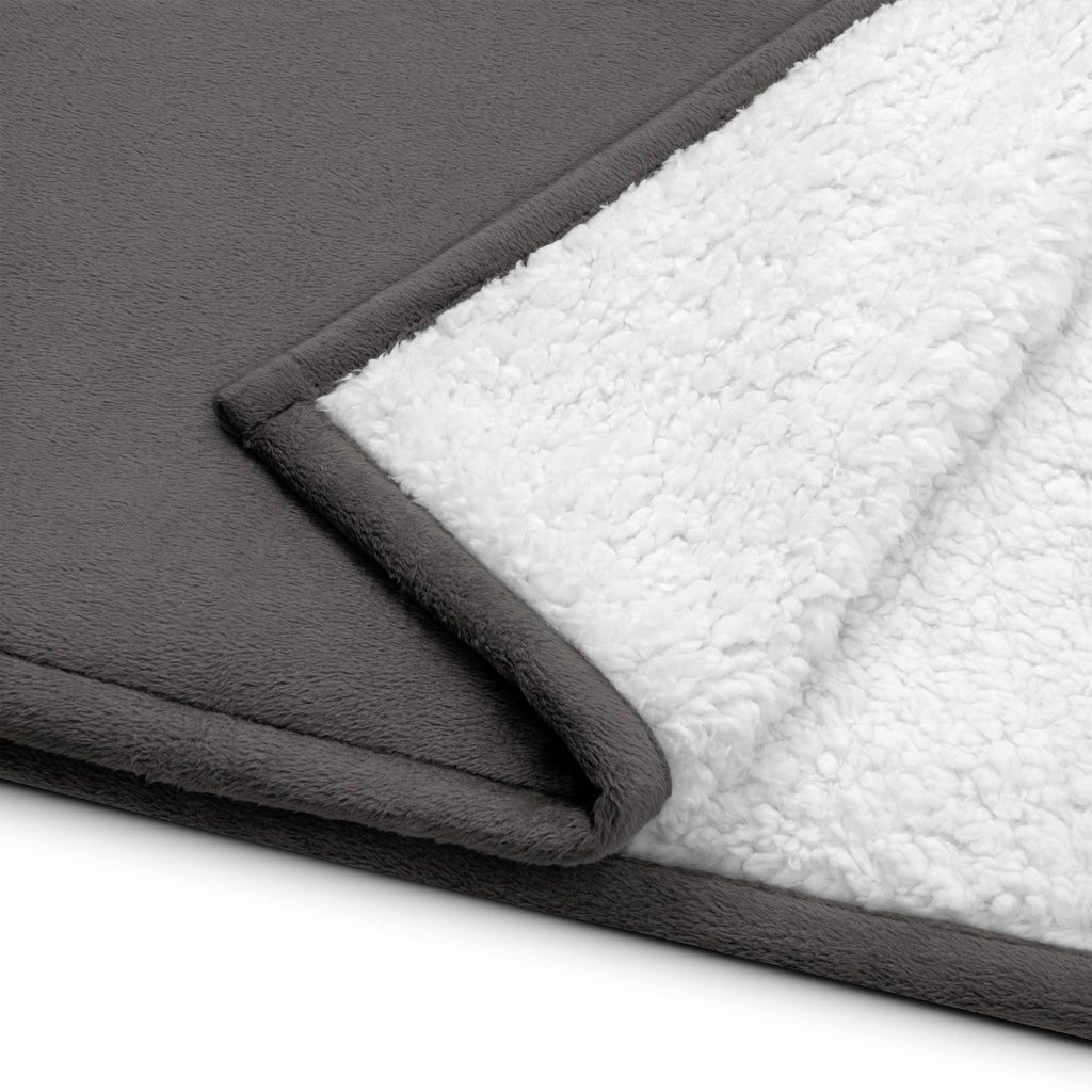 DORSAL premium sherpa blanket folded showing smooth sheeny fleece exterior and plush soft sherpa interior — view 5