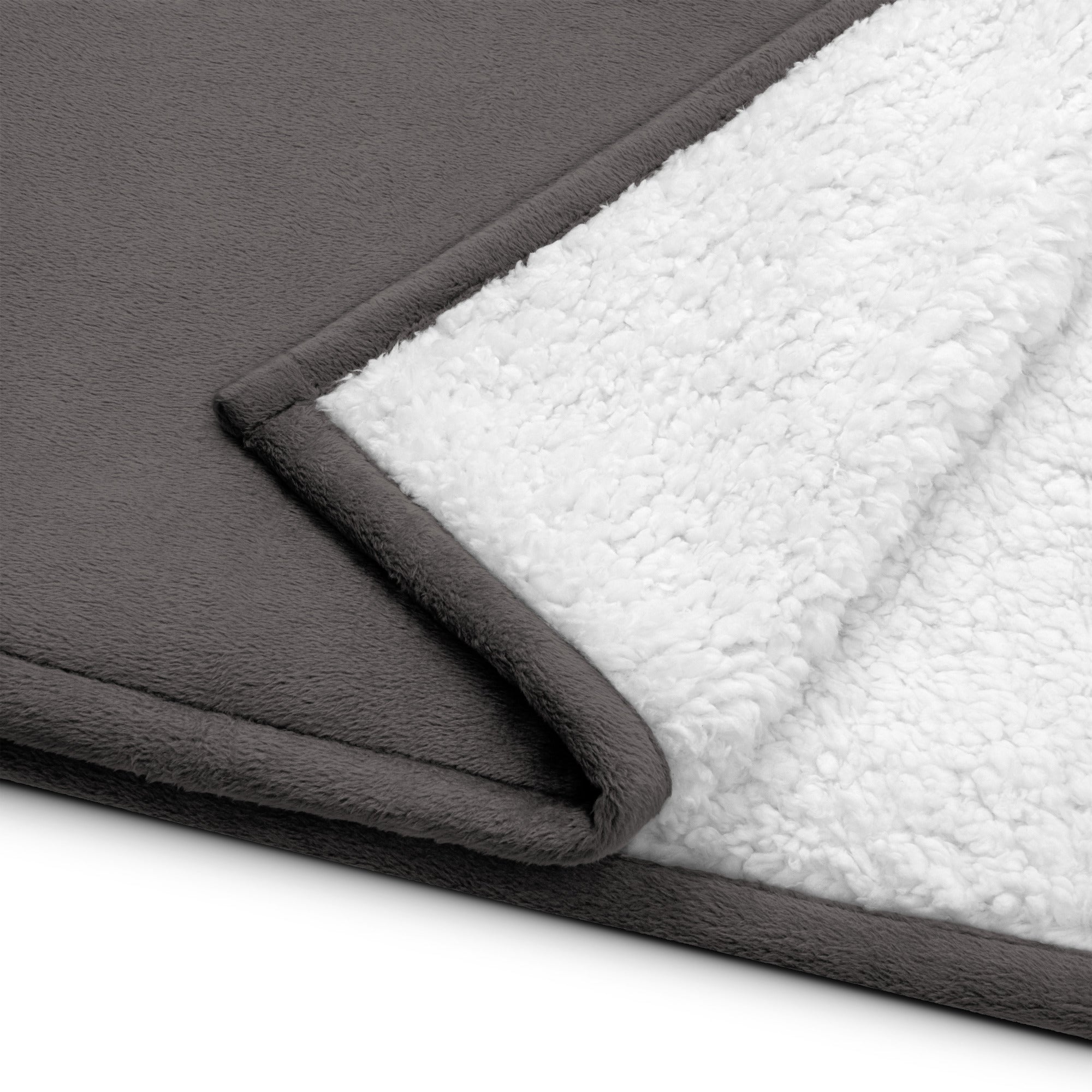 DORSAL premium sherpa blanket folded showing smooth sheeny fleece exterior and plush soft sherpa interior — view 5