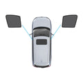 Magnetic mesh car window shade installed on a Subaru Outback blocking sunlight and UV rays