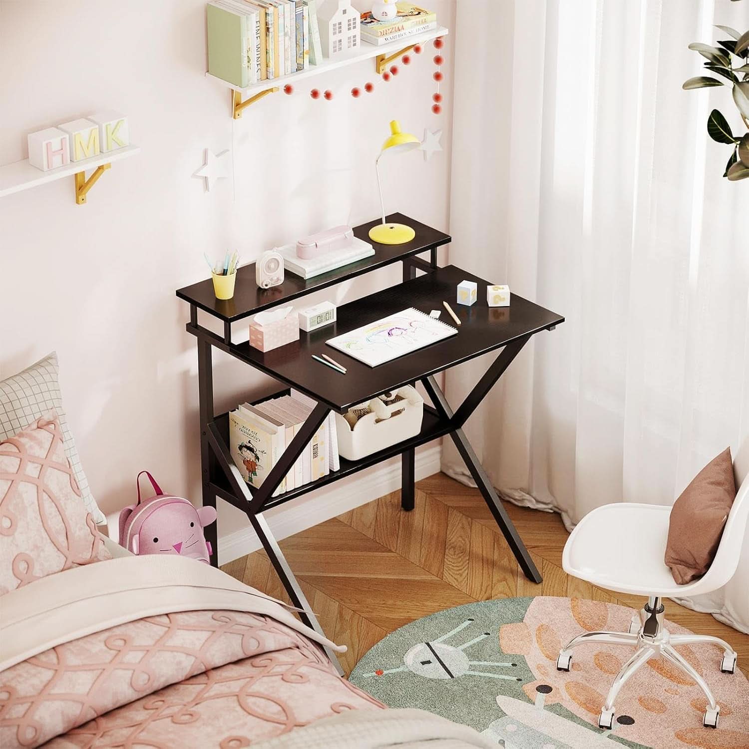 Compact 27.5-inch black computer desk with ergonomic monitor stand, lower storage shelf, and metal frame — view 4