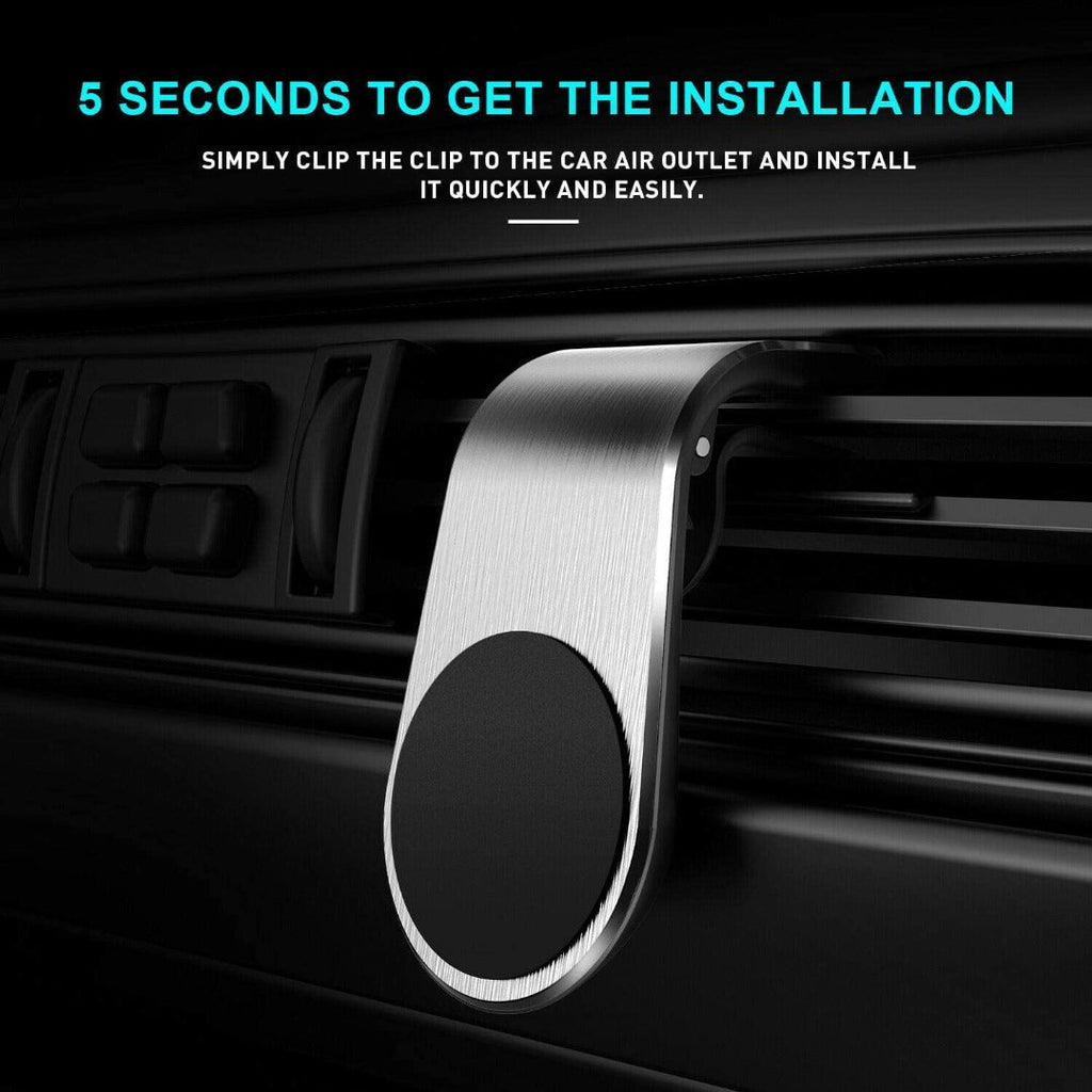 Black magnetic air vent car cell phone holder attached to a vehicle dashboard air vent — view 5