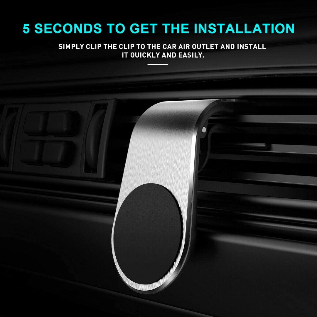 Black magnetic air vent car cell phone holder attached to a vehicle dashboard air vent — view 5