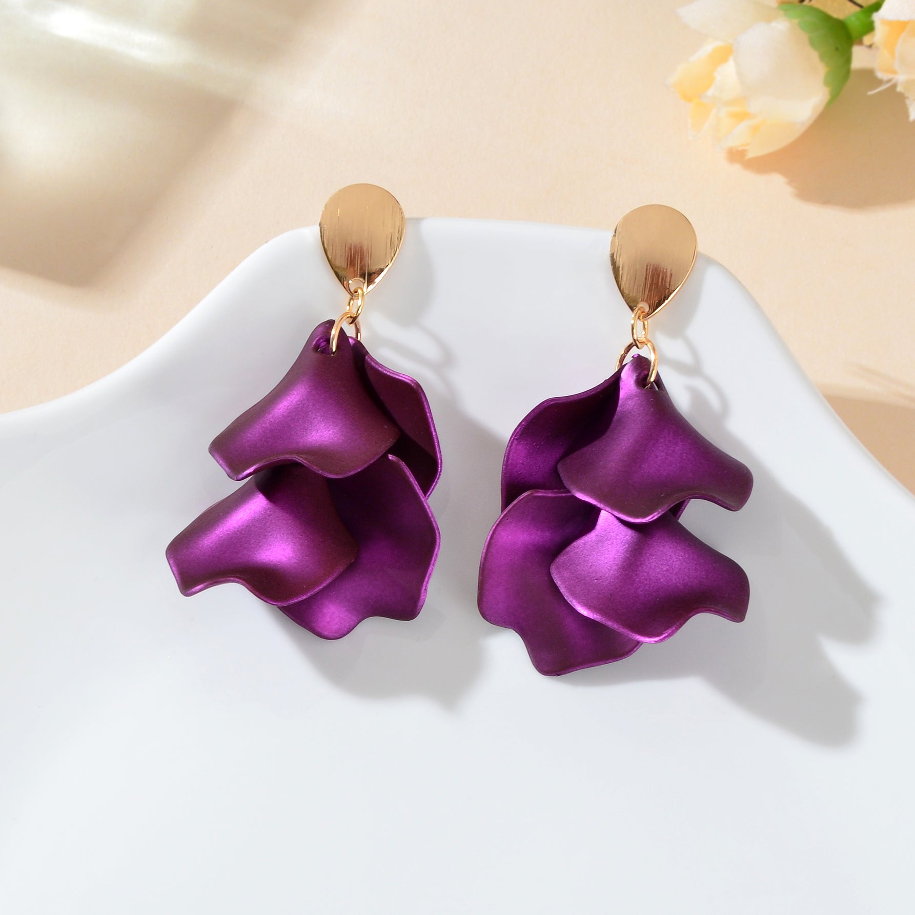 Elegant flower petal dangle earrings for women in shiny metal for daily and party wear — view 3