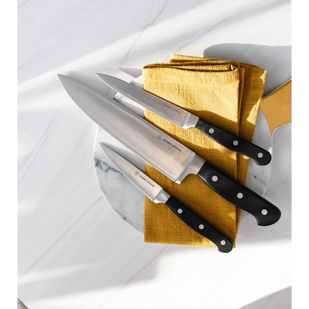4-piece kitchen knife set with black ergonomic handles and German steel blades with protective guards — view 2
