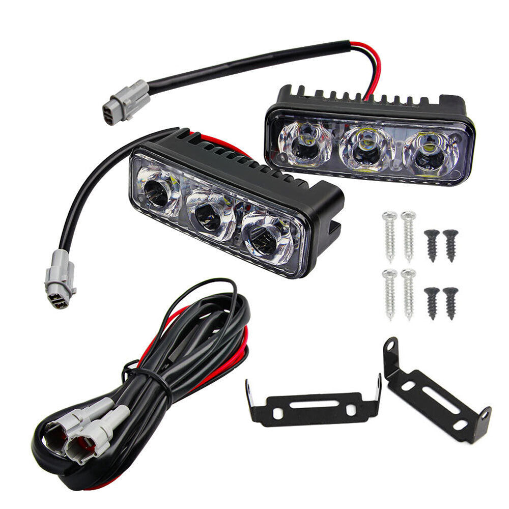 Black aluminum 3-LED daytime running lights with cool white beams and adjustable mounting brackets