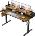 Electric adjustable standing desk with two drawers and control panel for ergonomic home office setups.