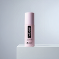Helloskin face moisturiser cream in a minimalist jar surrounded by fresh botanical ingredients