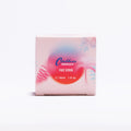 Delicate face scrub jar featuring natural bamboo extract and soothing organic rose water formulation.