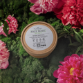 Natural clay face mask in zero-waste eco-friendly packaging with botanical ingredients for skincare routines